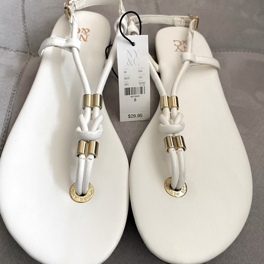 White thong sandals w/knot detail and gold accents